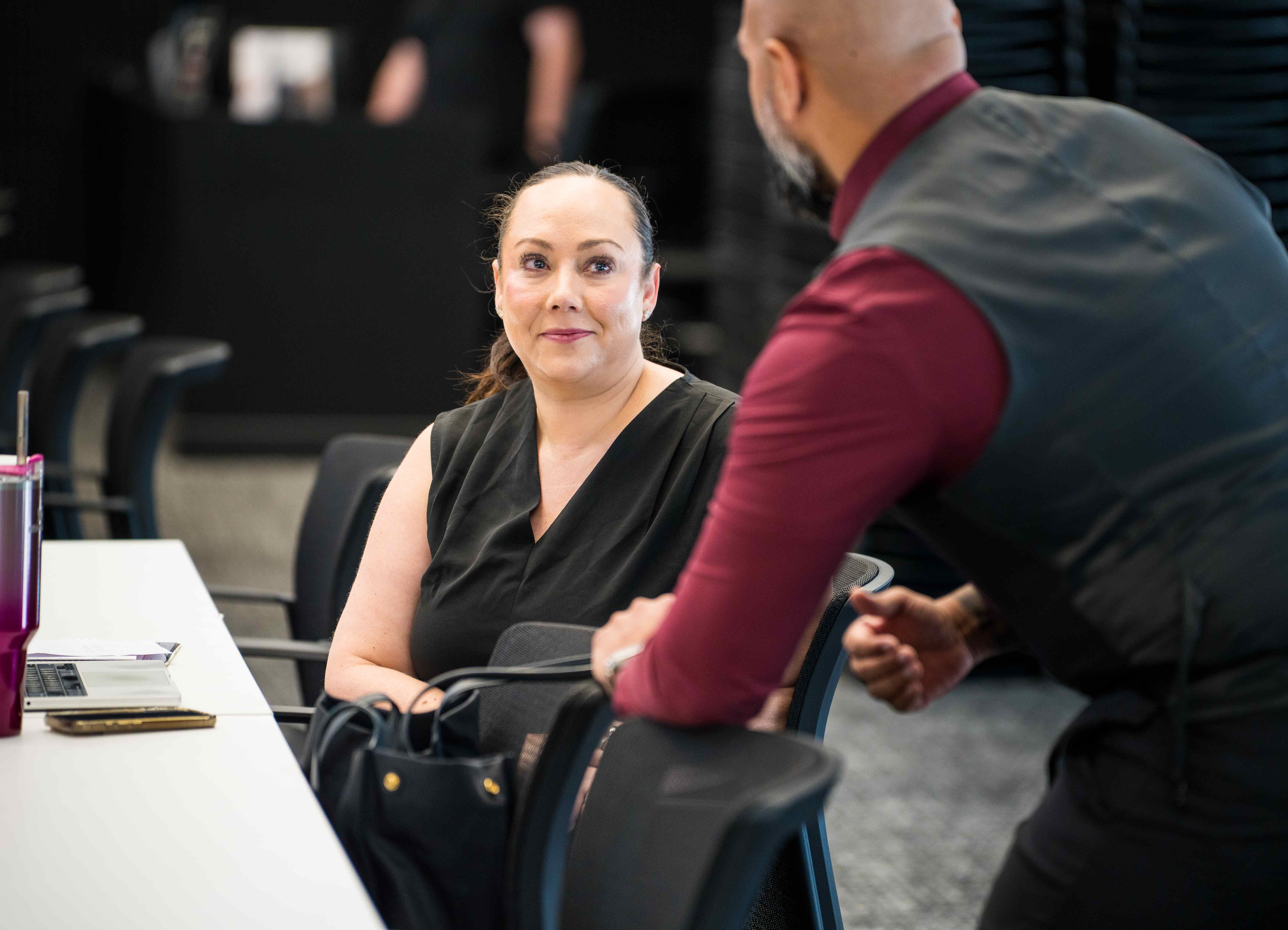 Member engaged in advisory conversation